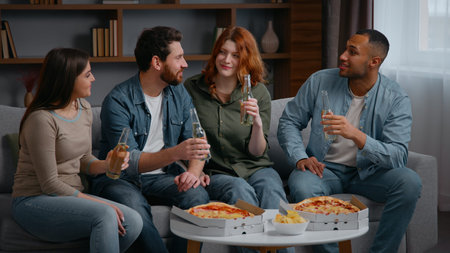 Happy multiethnic four friends at home party cheers clinking bottles multiracial people men women...