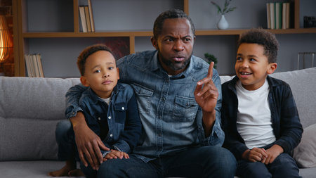 African American family at home single father man with two children boys dad showing hush silence...