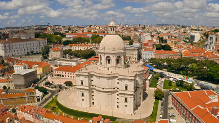 Aerial view National Pantheon Lisbon Portugal drone flying top above old buildings beautiful architecture with baroque dome Alfama district red rooftops inspiration cultural heritage site travel tripの写真素材