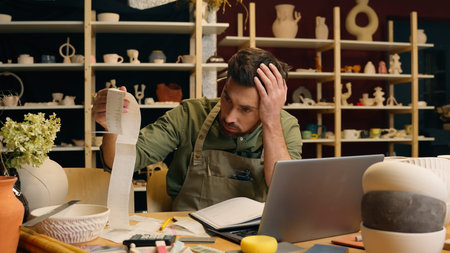 Shocked frustrated Caucasian man male small business owner potter gut businessman examining large...