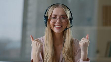 Close-up Caucasian business woman in headset talking looking at camera web cam view businesswoman...