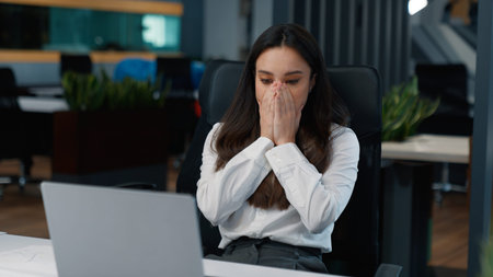 Caucasian business woman receive bad news message laptop email businesswoman shock emotion with computer notification lady agent female girl shocked with reject specialist professional sad in officeの写真素材