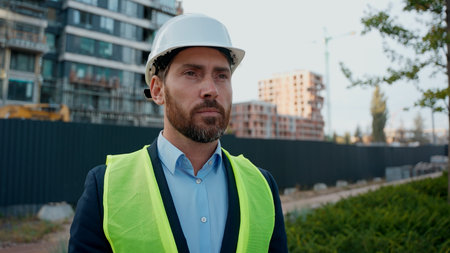 Tired exhausted builder Caucasian man engineer take of hardhat end working day middle-aged inspector...