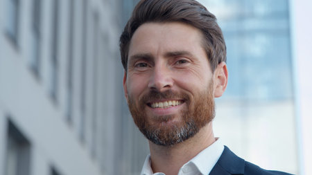 Close-up carefree positive Caucasian middle-aged business man looking smiling at camera businessman...
