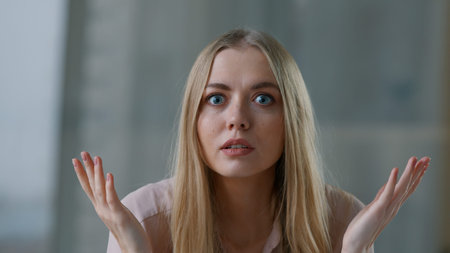 Close-up portrait shocked amazed Caucasian business woman looking at camera taking off glasses say wow open mouth girl businesswoman female look surprised terrible horror reaction shock in officeの写真素材