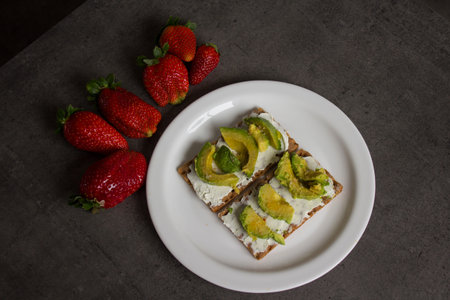 Fresh breakfast on grey table. Healthy eating concept.
