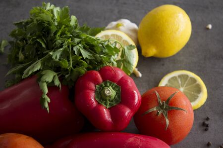Fresh vegetables top view photo on dark grey background. Healthy eating concept.の写真素材