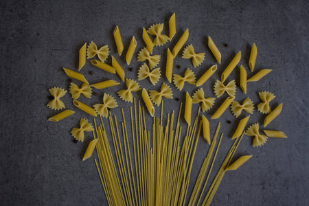 Bouquet made of dry pasta. Still life food photo.