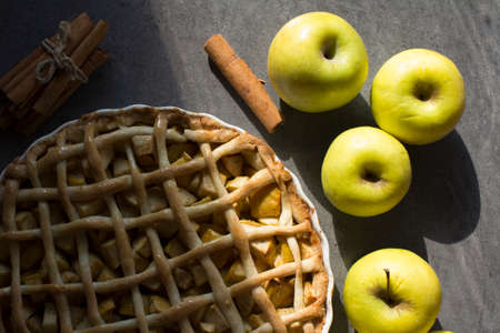 Apple pie. Classic autumn cake on a table. Fresh baked homemade dessert.の写真素材