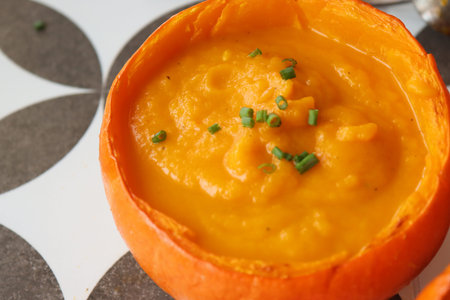 Butternut soup top view photo. Healthy food. Autumn menu ideas. Tasty creamy soup close up.の写真素材