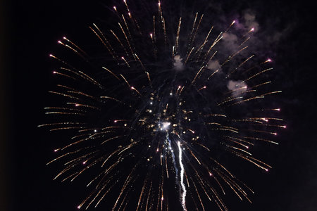 Colorful fireworks on the black sky background, closeup of photo