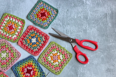 Handmade crocheting. Composition on a gray background.の写真素材
