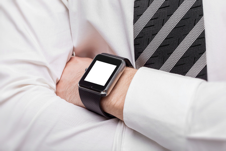 Mockup of crossed male hands with smart watch with isolated screen.の写真素材
