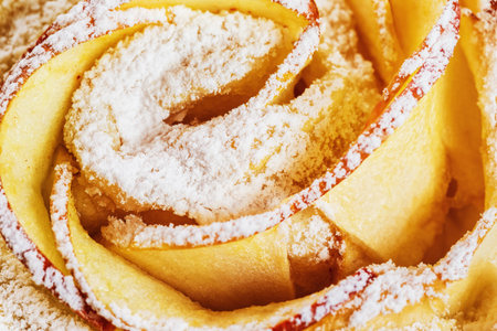 Closeup image of fresh twisted bakery with sweet sugar powder.の写真素材