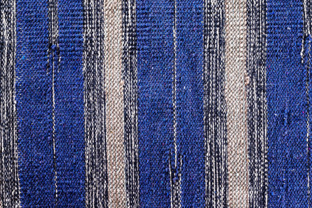 Closeup image of colorful Indian carpet as an abstract textile background.