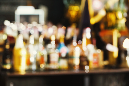 Vintage color blurred bar counter background.の写真素材