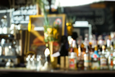 Vintage color blurred bar counter background.の写真素材