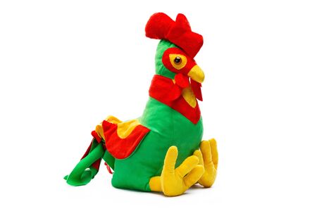 Image of festive toy rooster sitting at isolated white background.の写真素材