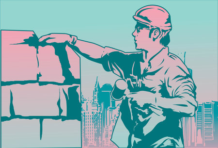 Image of a mason who is working on brick for his construction site.の写真素材