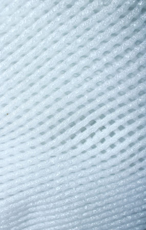 Abstract blurred light grey mesh texture background with soft gradient and subtle depth. Clean...