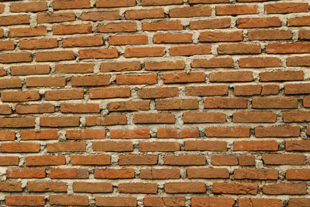 Rustic Red Brick Wall Texture with Exposed Mortar. Full Frame Masonry Background for Industrial...