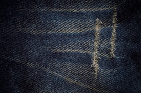 Blurry background of texture vintage blue denim jeans