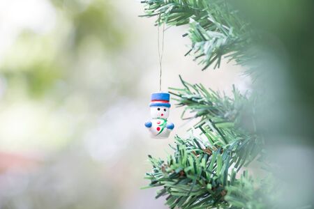 Snow man dall for Christmas decoration backgroundの写真素材