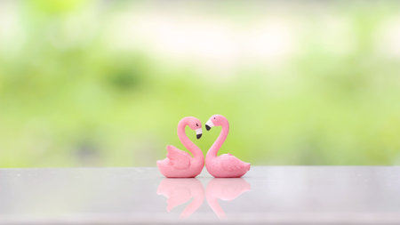 Flamingo couple in love with natural background for Valentine's day or Wedding concept