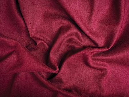 Fabric texture of natural cotton, wool, silk or linen textile material. Rose gold fabric backgroundの写真素材