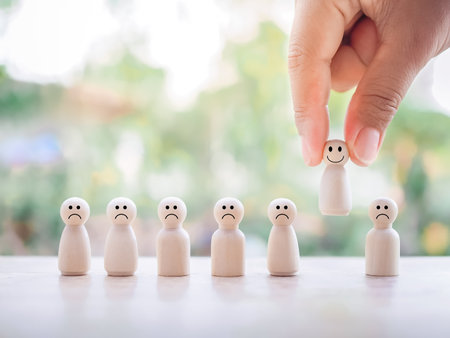Select wooden business figure with happy face and 5 star,Customer service rating experience, feedback emotion and satisfaction survey.の写真素材