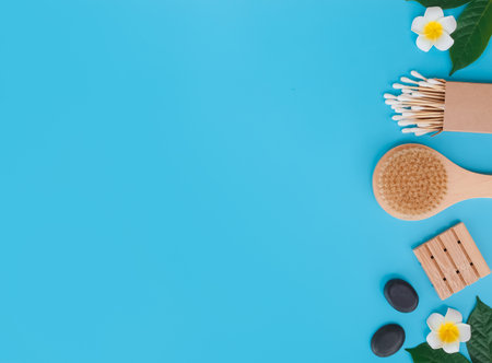 Directly above view of spa products on blue background, Healthcare spa concept with copy spaceの写真素材