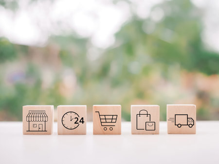 Wooden block with online shopping and e-commerce icons set.
