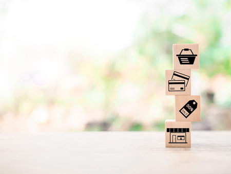 Wooden block with online shopping and e-commerce icons set.の写真素材