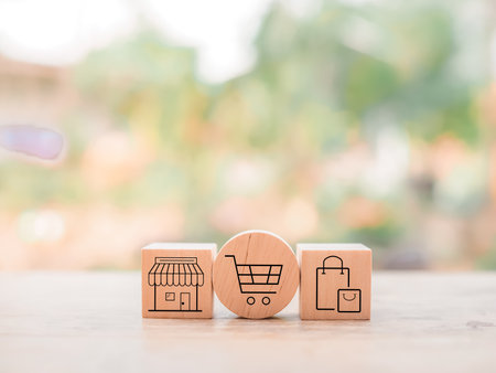 Wooden block with online shopping and e-commerce icons set.の写真素材