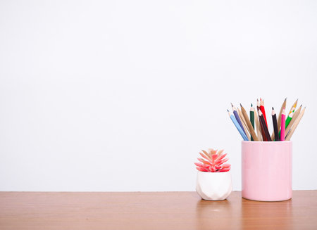Office desk table, Student creative desktop with colorful stationery and potted cactus. Copy space for text, Back to school, Education conceptの写真素材