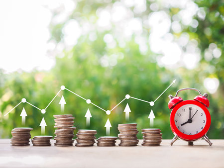 Red alarm, Stack of coins with arrow up icons and trading chart. The concept of Financial investment, Market stock, Profit return, Dividend and Business fund.の写真素材