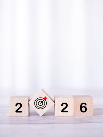 Wooden blocks with the number 2026 with nature background. The concept of Goal achievement , target,...
