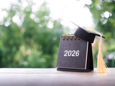 Study goals, 2026 Desk calendar with graduation hat. The concept for Resolution, Goal, Action,...