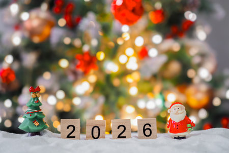 Close up of number 2026 and Christmas decorations with Christmas light background. Merry Christmas and Happy New Year 2026の写真素材