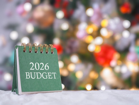 Close up of 2026 desk calendar with shiny light for Christmas background. The concept about budget...