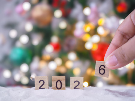 Close up of number 2026 and Christmas decorations with Christmas light background.の写真素材