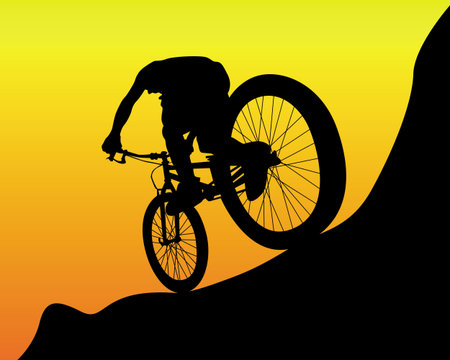 black silhouette of a mountain biker on an orange backgroundのイラスト素材