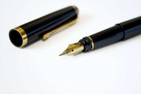 black ink pen on a white backgroundの写真素材