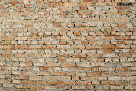 old wall lined with red brick