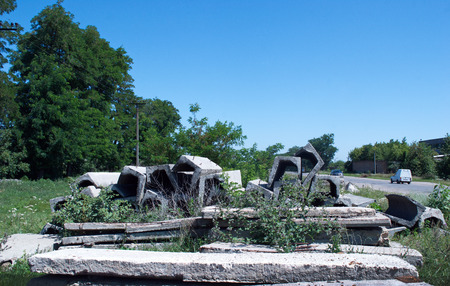 old concrete slabs for floors lying on the grassの写真素材