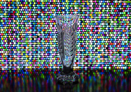 glass transparent vase for flowers on the background of different shapesの写真素材