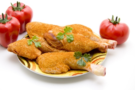 Chickens thigh with tomato and paprikaの写真素材