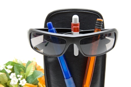 Ballpoint pen and sunglassesの写真素材