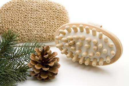 Massage brush with pine coneの写真素材