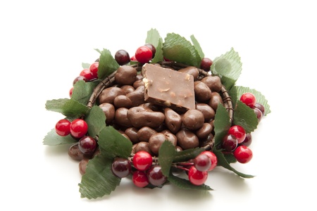 Chocolate in the wreath with berriesの写真素材